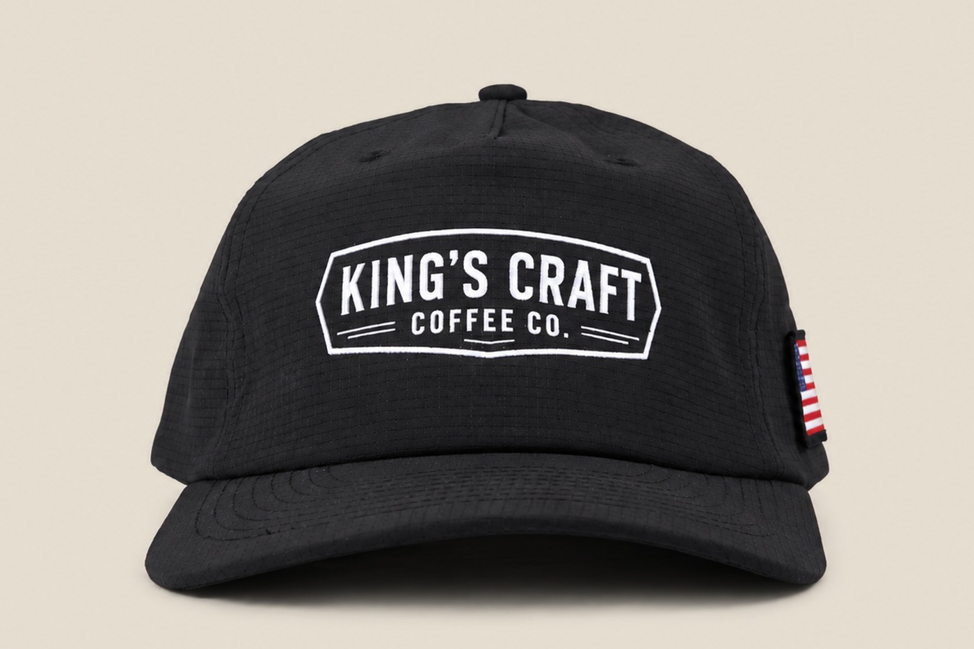 Black ripstop King's Craft Coffee cap with flag patch, front view
