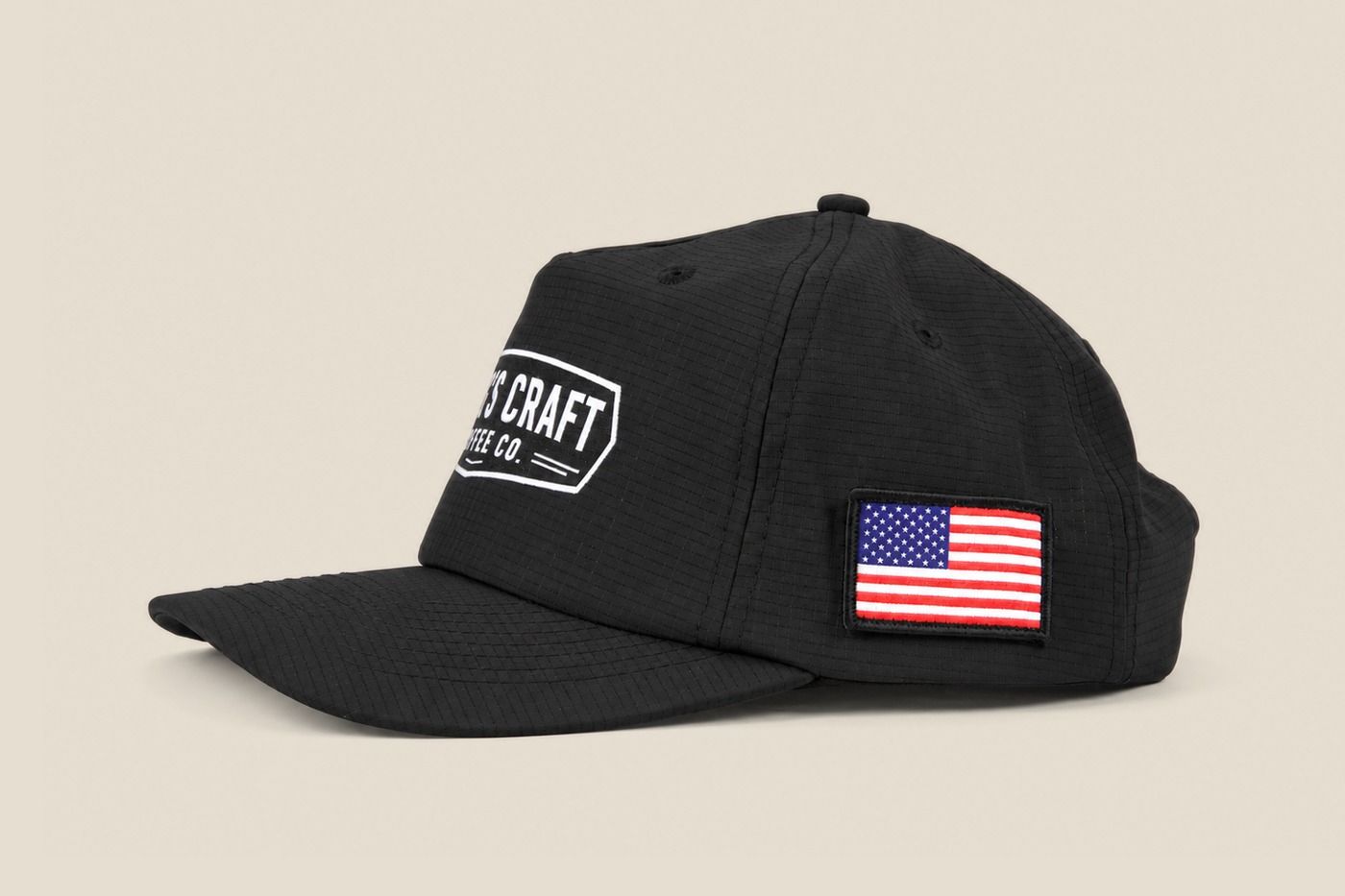 Black ripstop King's Craft Coffee cap, side profile with flag patch