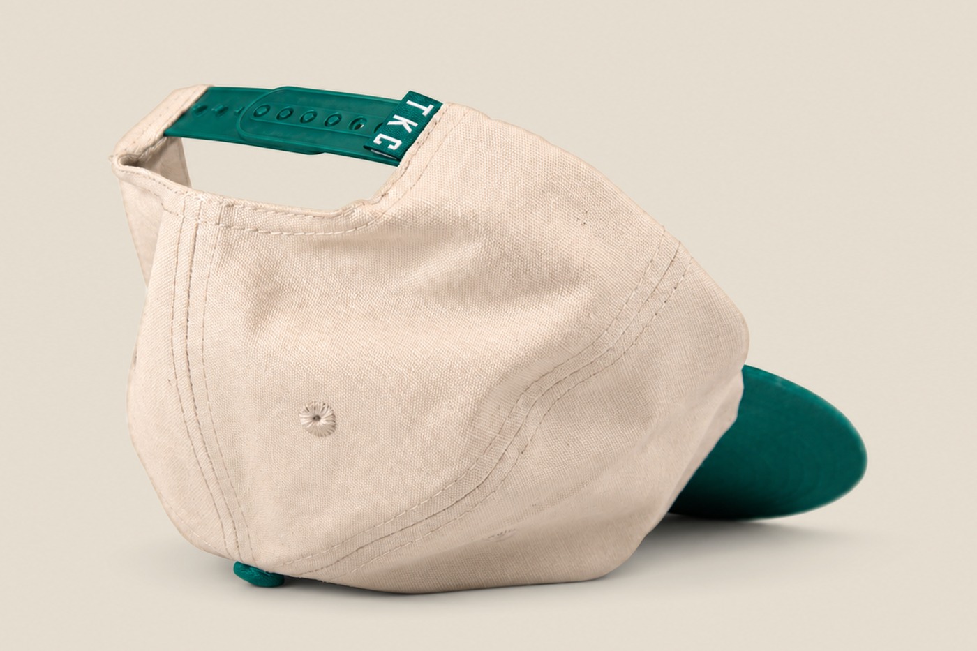 Cream and green King's Craft Coffee cap, back with green snapback strap