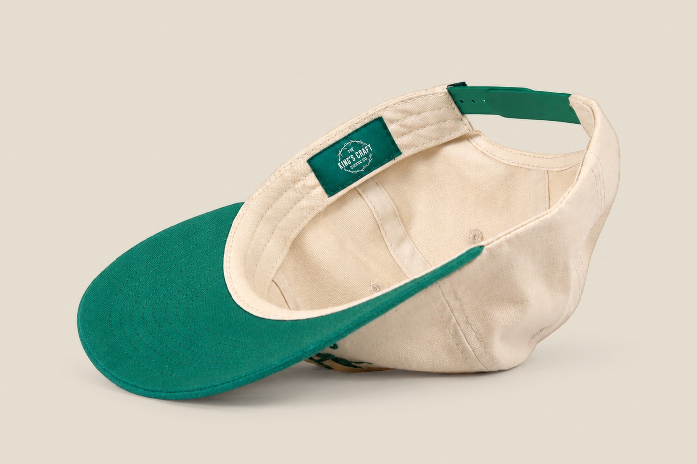 Cream and green King's Craft Coffee cap, interior with green under brim